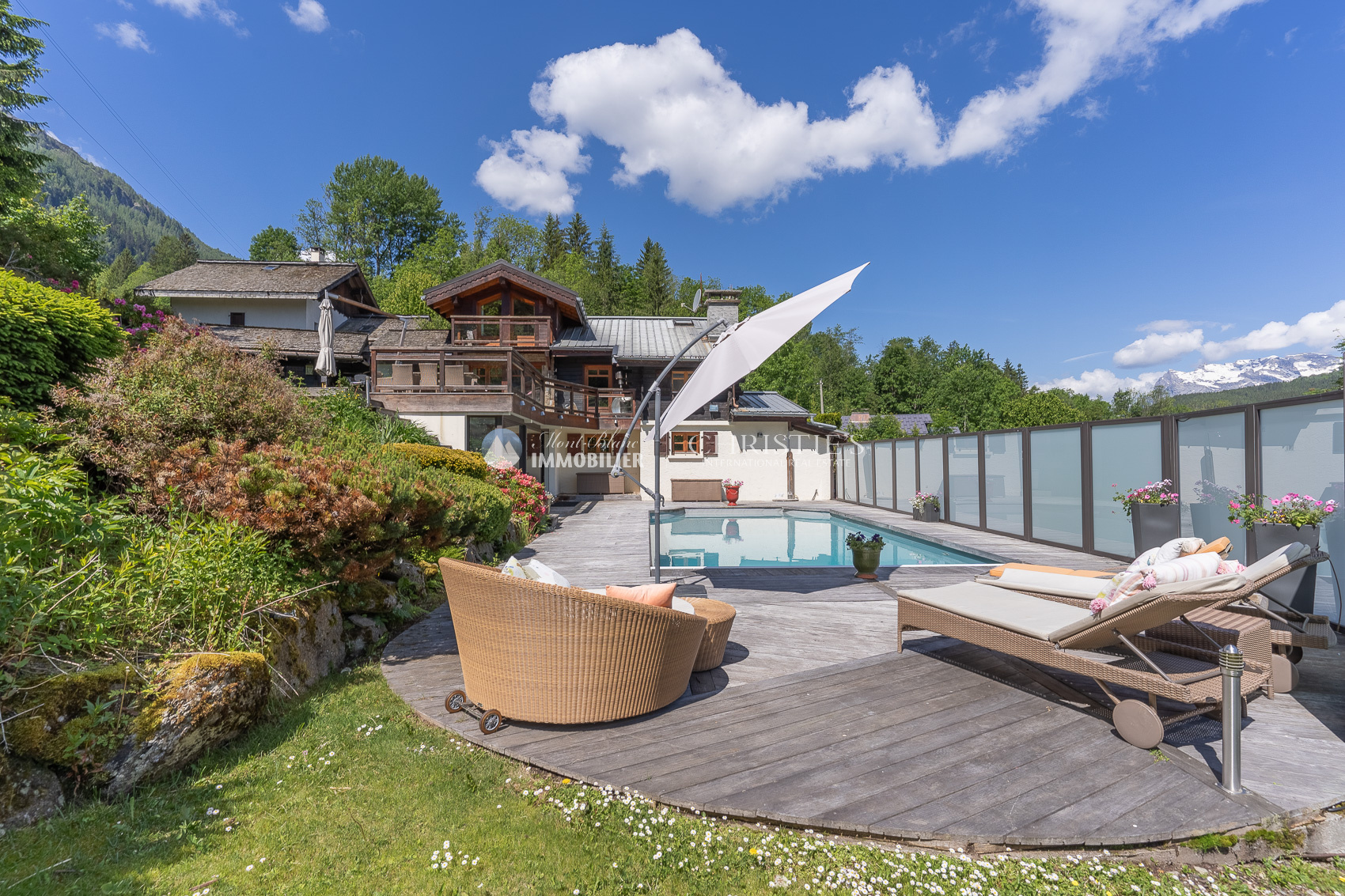 Photo of Charming chalet with heated outdoor swimming pool