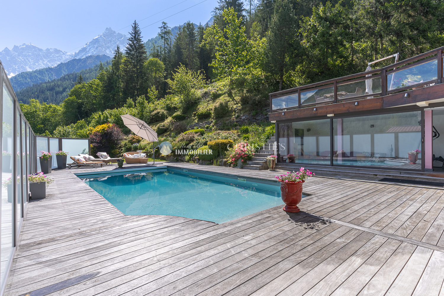 Photo of Charming chalet with heated outdoor swimming pool